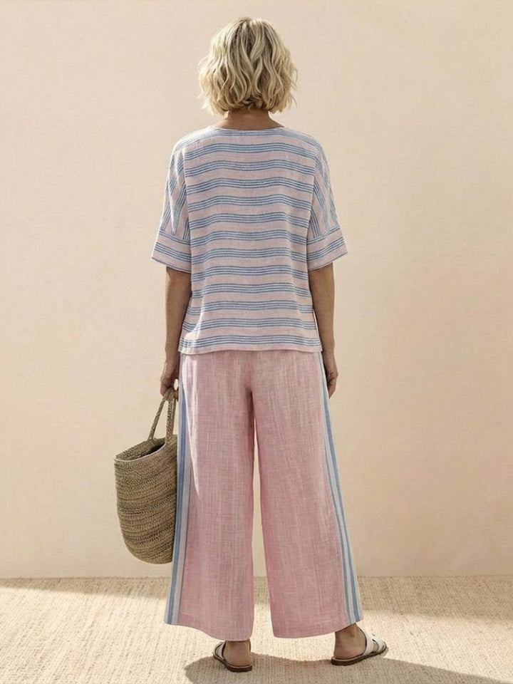 Detailed view of Paloma wide-leg pants hem showing cropped length
