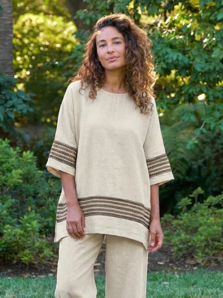 Three-quarter view of the Paloma set in Neutral Stripes
