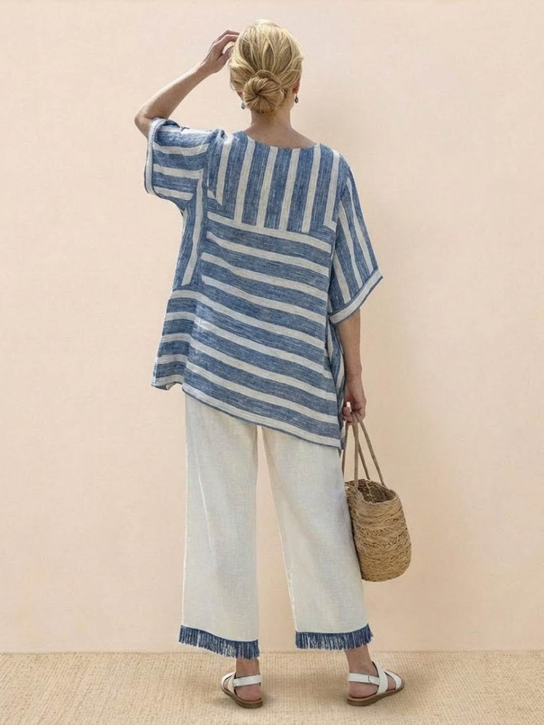 Paloma oversized tee front view showing relaxed fit and chest pocket