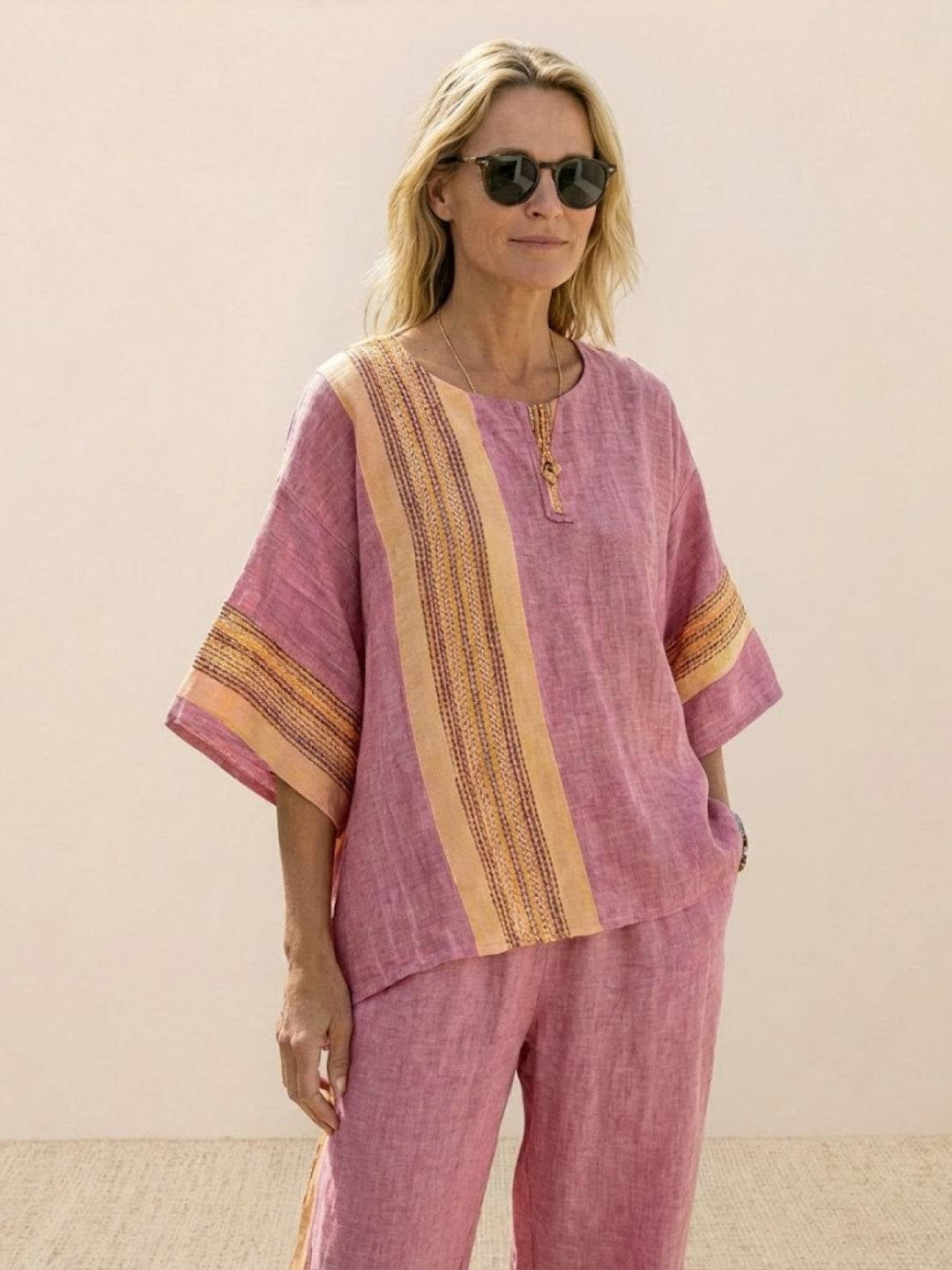 Paloma set on hanger showing both pieces together in Neutral Stripes