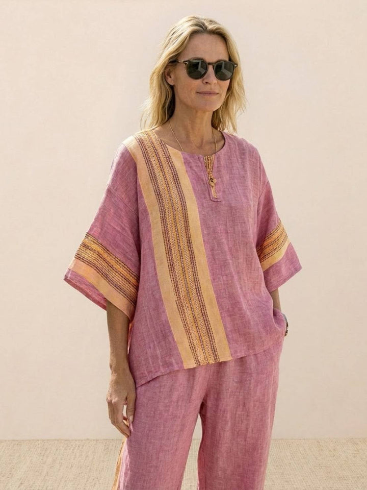 Paloma set on hanger showing both pieces together in Neutral Stripes