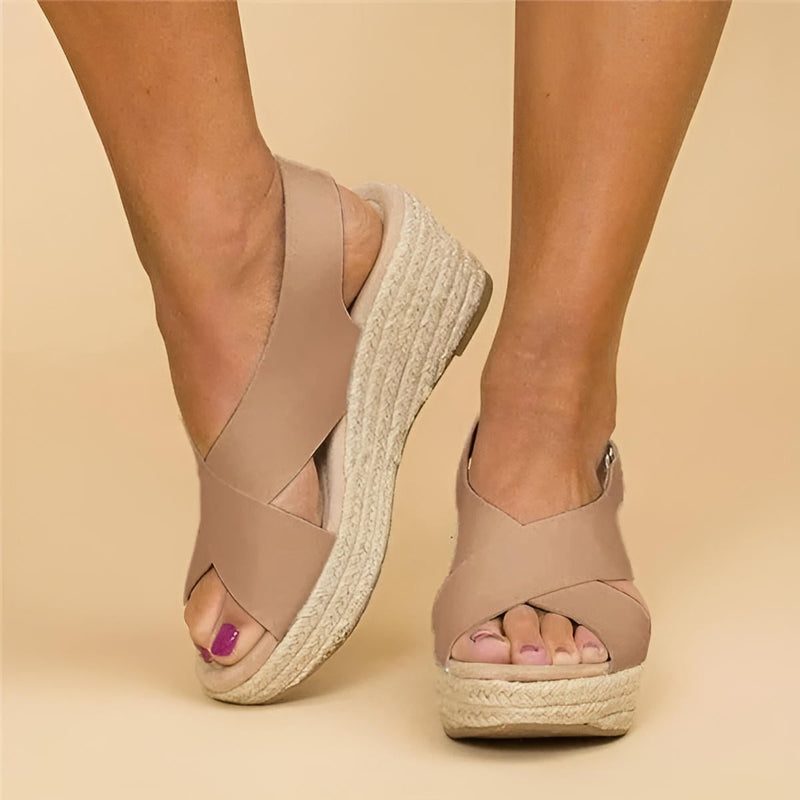 Paloma espadrille wedge sandal with cross straps in brown, side view showing jute-wrapped wedge sole