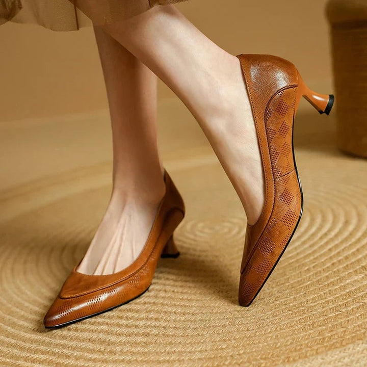 Paloma pointed toe kitten heel pumps in brown, front three-quarter view