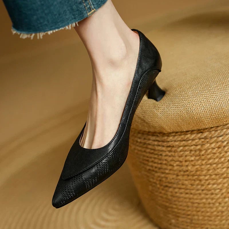 Paloma pointed toe kitten heel pumps in black, top-down view showing pointed toe