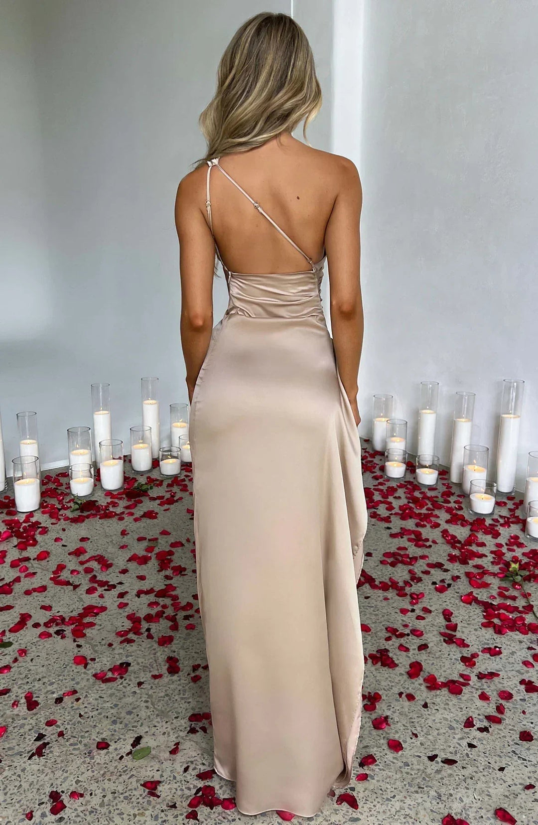 Dark pink one-shoulder floor-length dress with fitted silhouette and side slit
