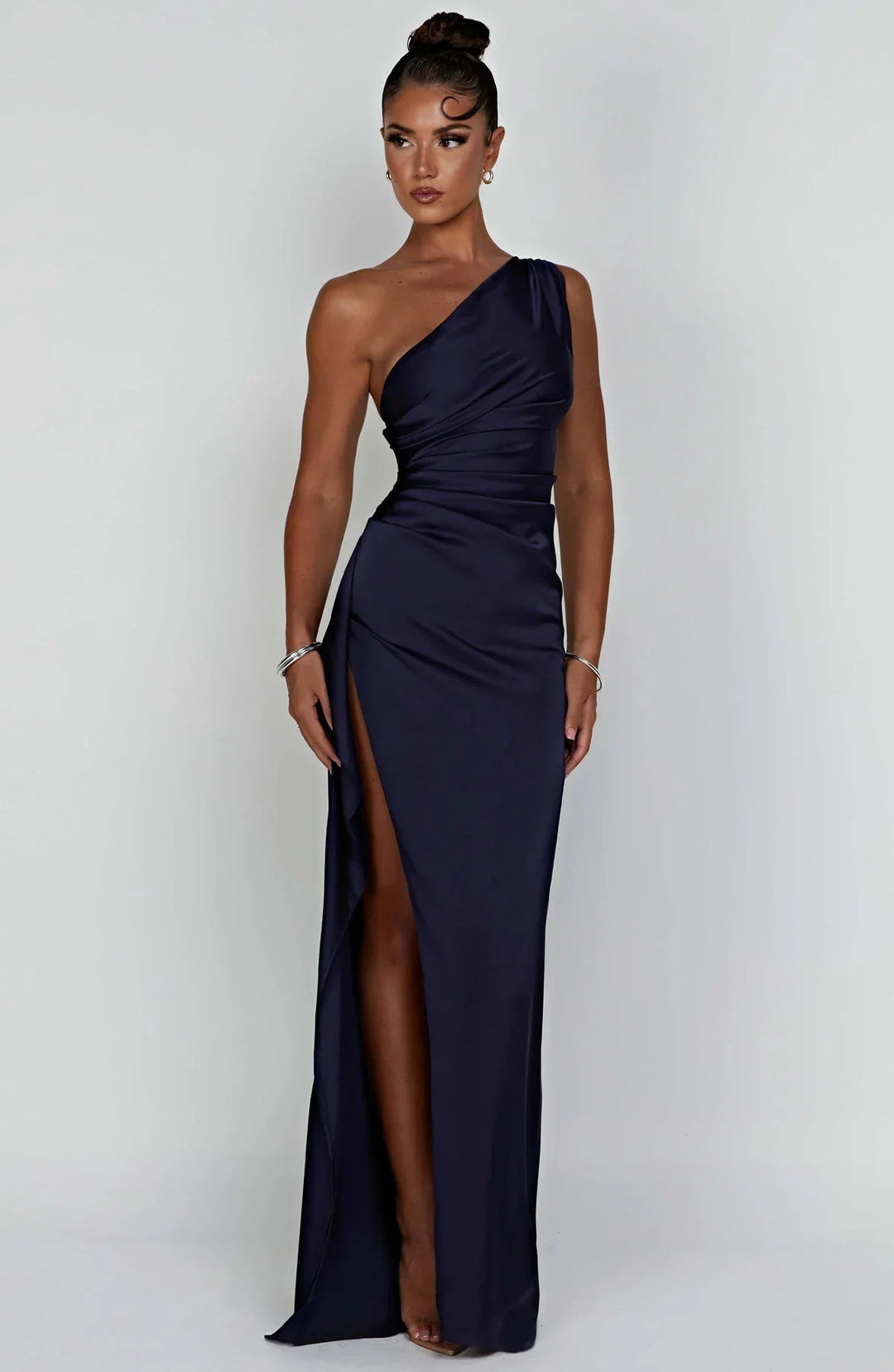 Dark pink fitted one-shoulder dress side view with slit