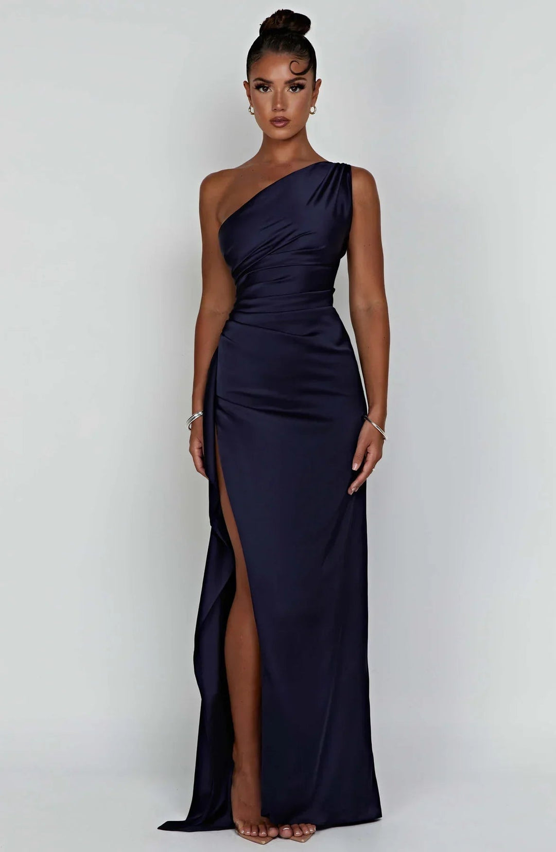 Navy blue one-shoulder maxi dress close-up of slit detail