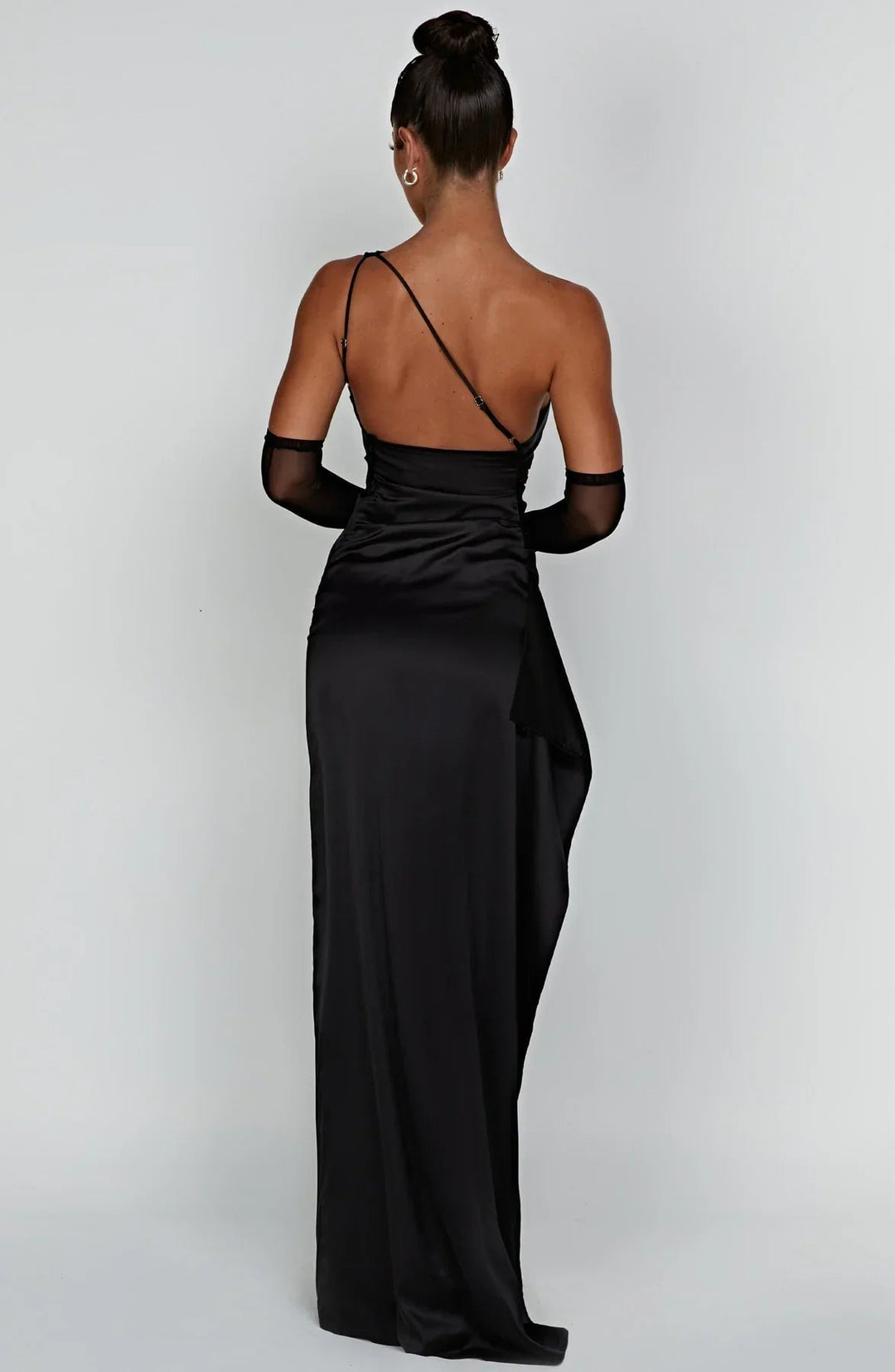 Beige one-shoulder dress side view showing floor length