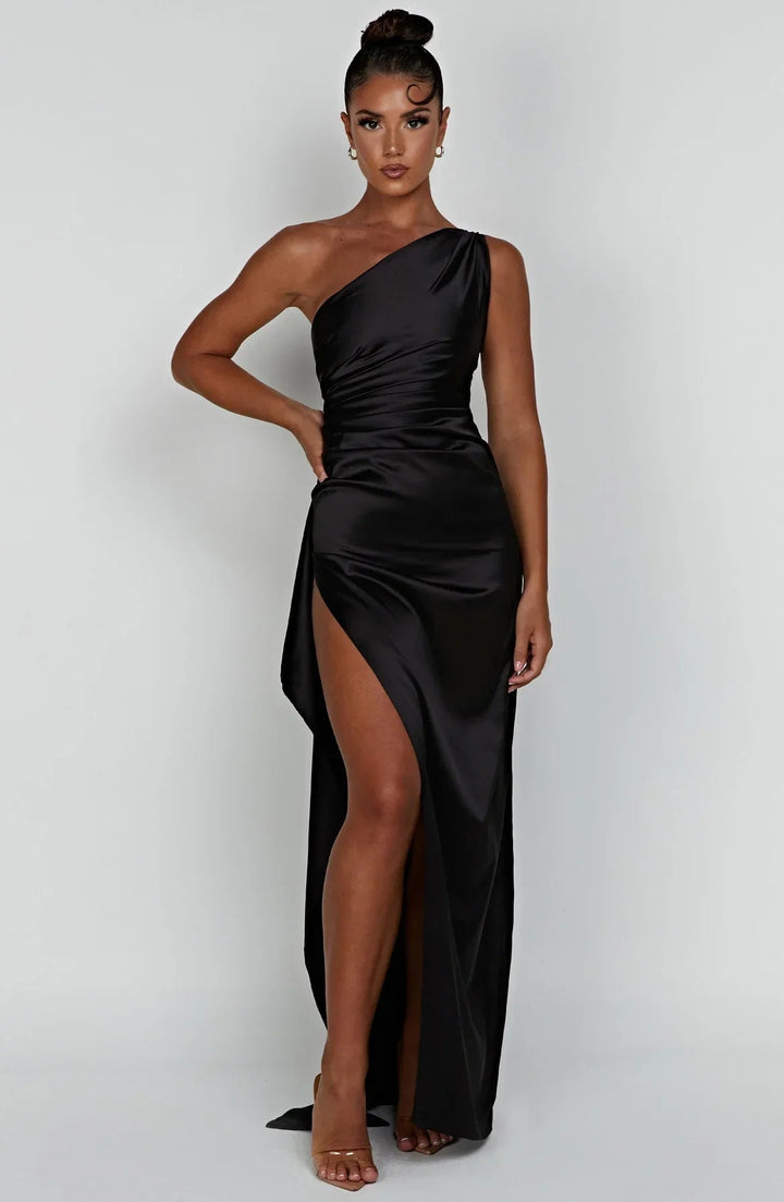 Red one-shoulder gown three-quarter back view
