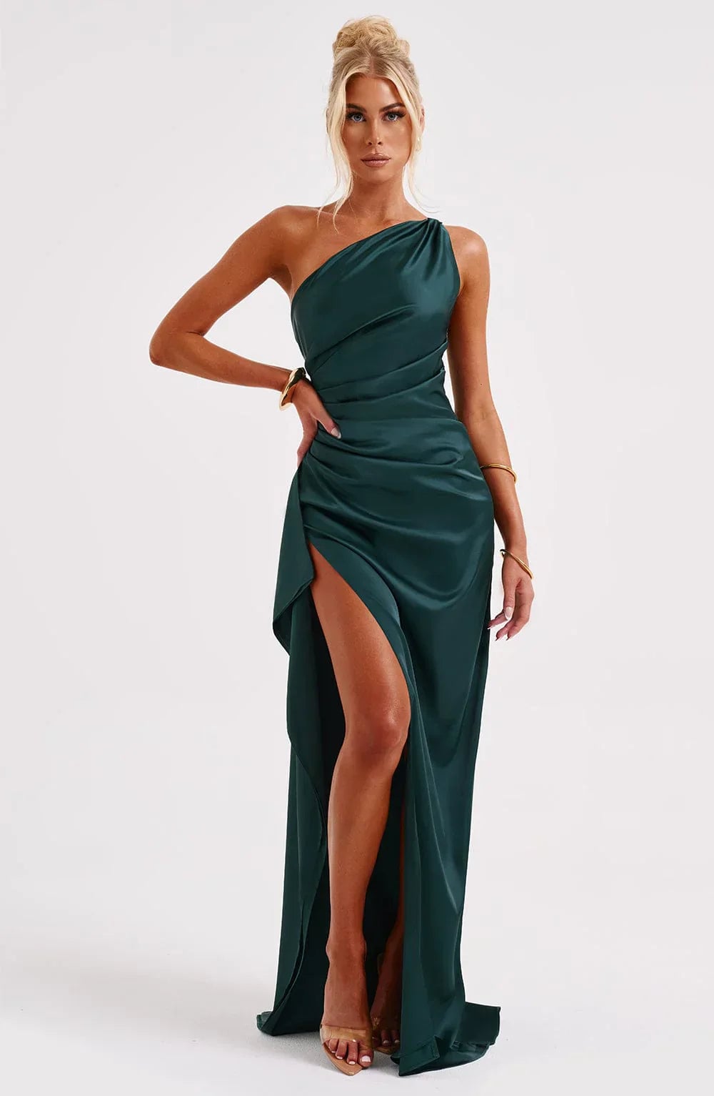 Red fitted one-shoulder evening gown close-up waist detail