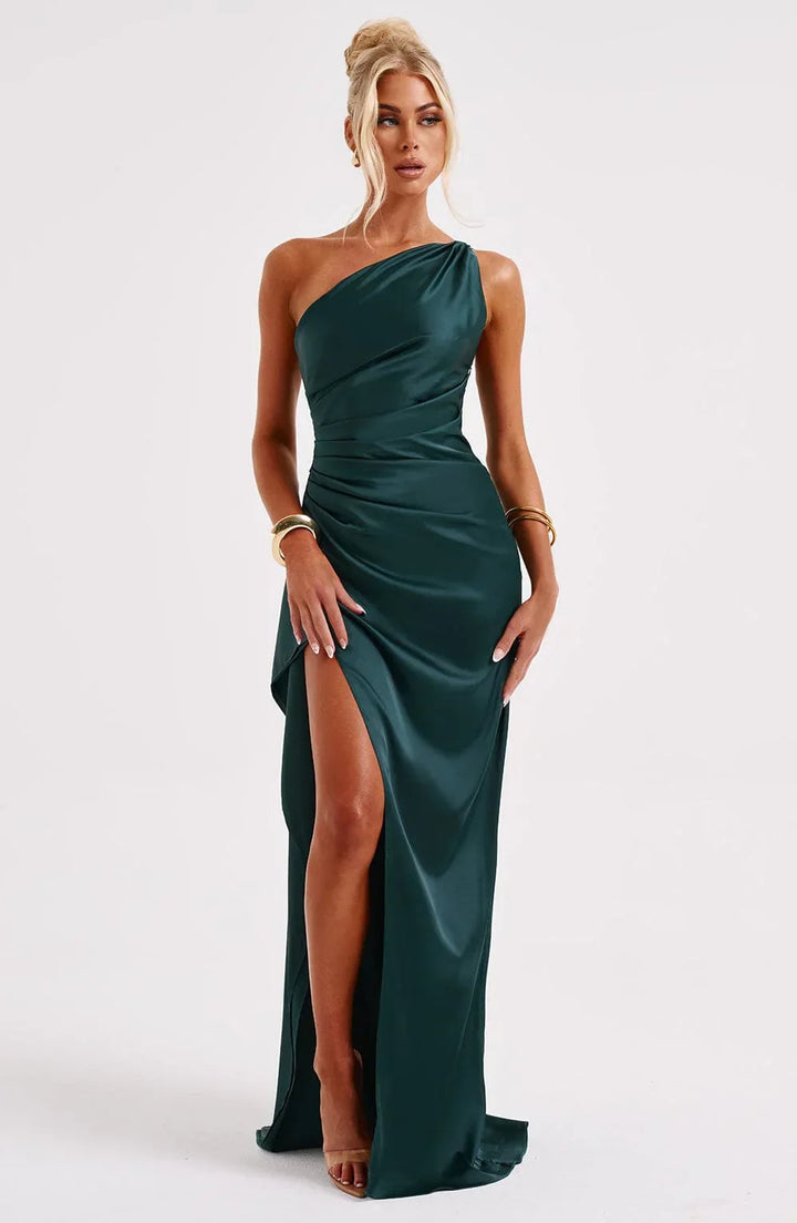 Beige one-shoulder evening dress close-up lower skirt and slit