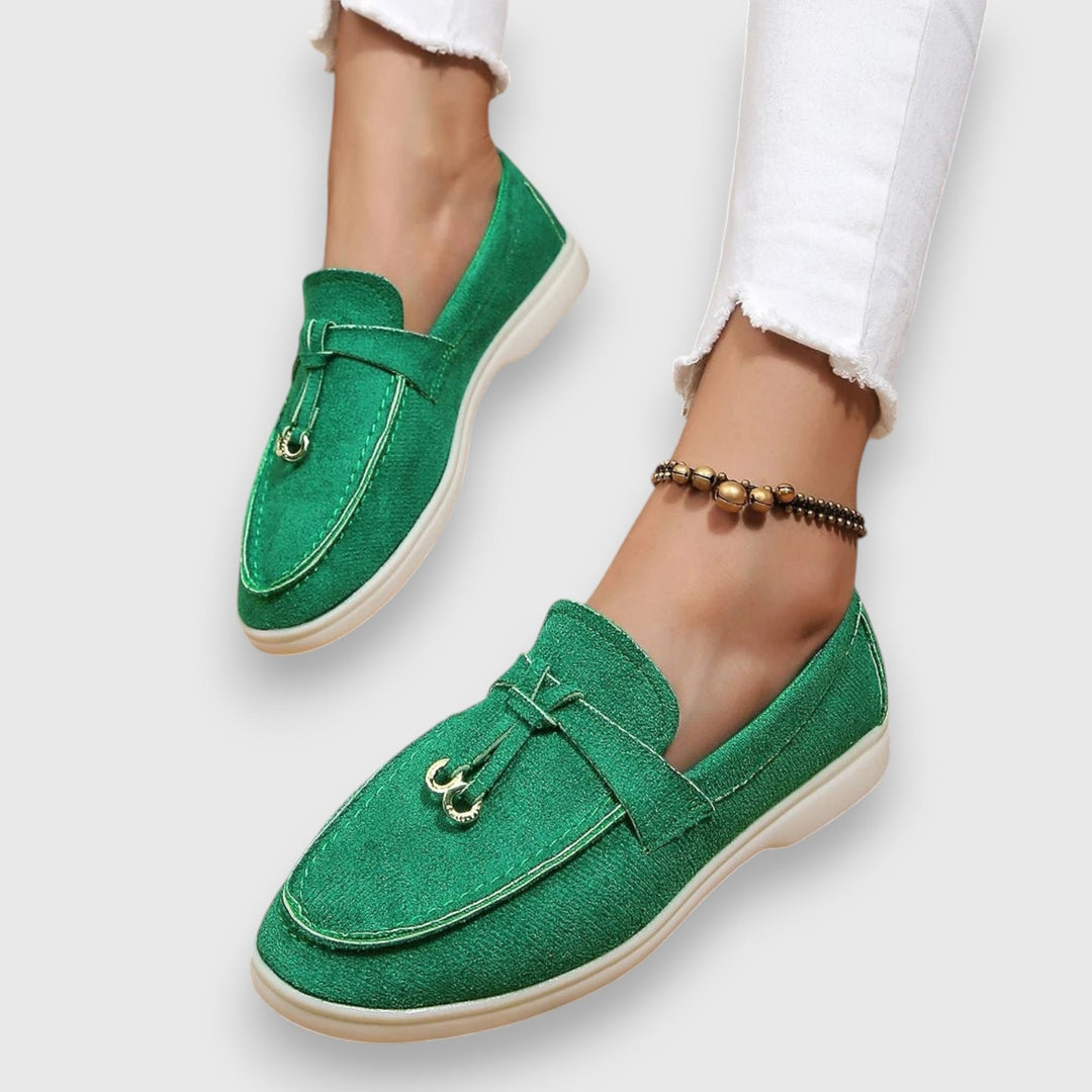 Parker loafers in green showing flexible slip-on opening, close-up