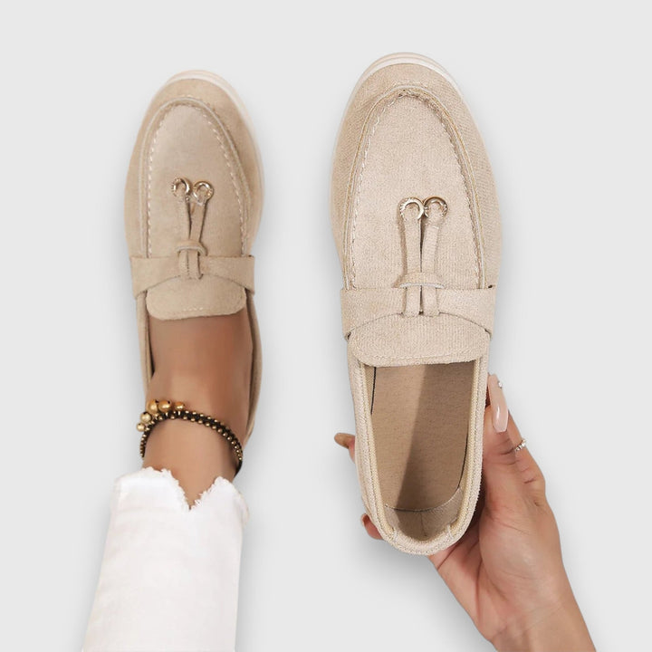 Parker women's loafers styled with straight-leg jeans, lifestyle shot