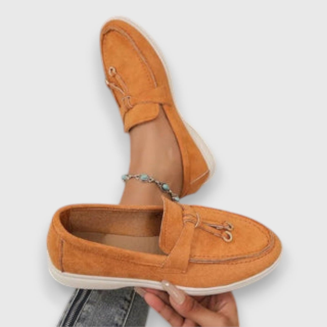 Parker slip-on loafers in multiple colors arranged together, color variety flat lay