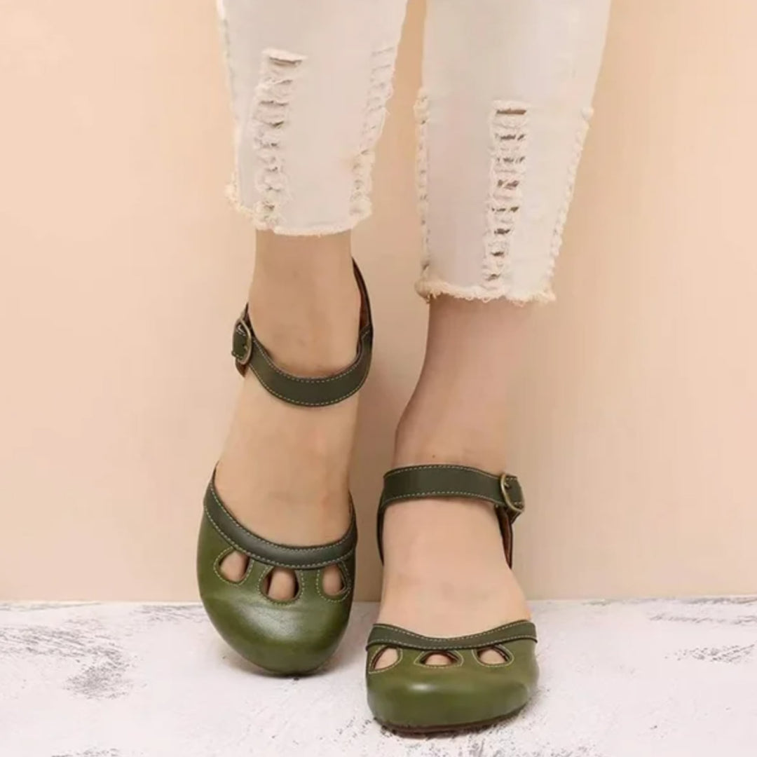 Patti low-heeled sandals in multiple colors with orthopedic arch support, side view on white background