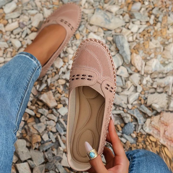 Paulette flats in brown displayed from above highlighting arch support structure