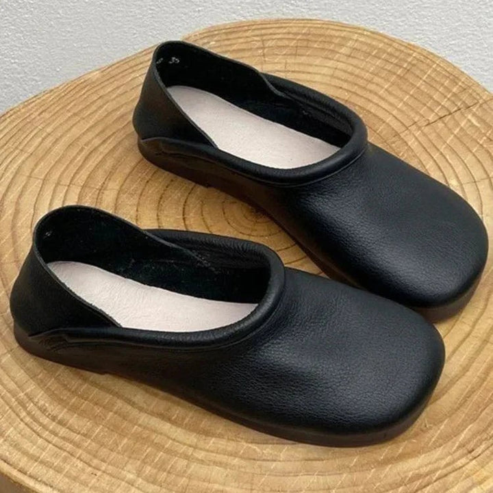 Pearl sandals in all three colorways — brown, khaki, and black — arranged together