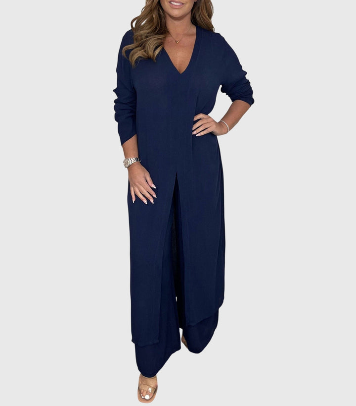 Model styling the two-piece duster set with heels for an occasion-ready look