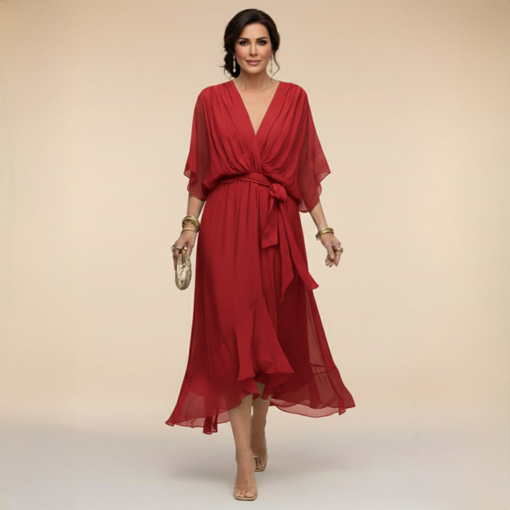 Full-length view of women's wrap midi dress showing versatile midi hemline