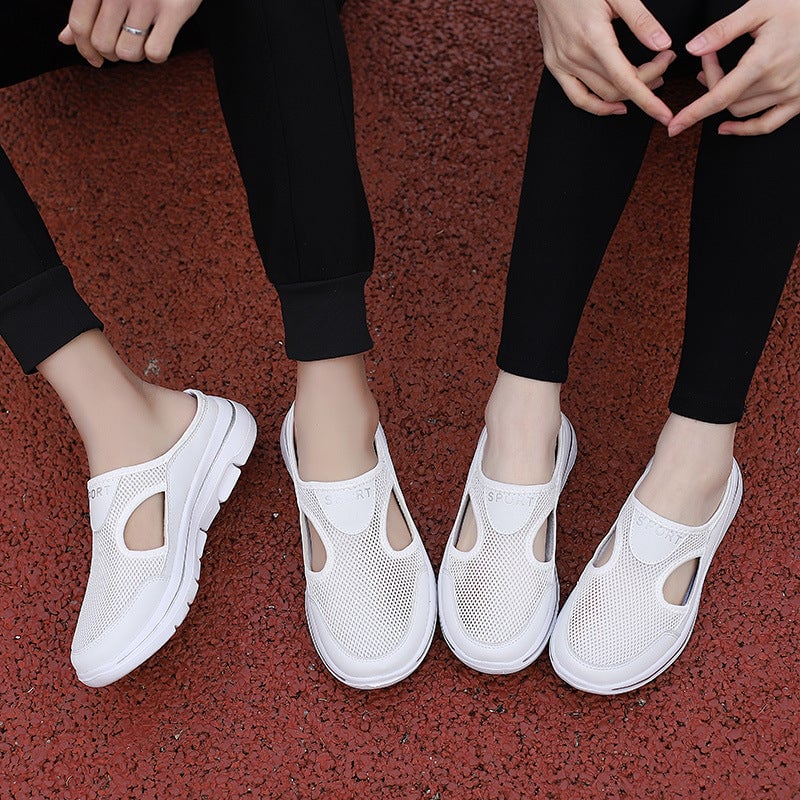 Angled view of white Peony sandals showing lightweight sole construction