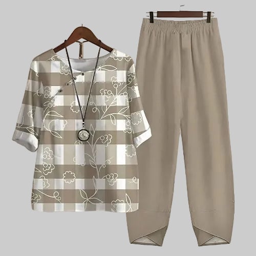 Butterfly print wide leg pants and short sleeve top set styled for casual wear