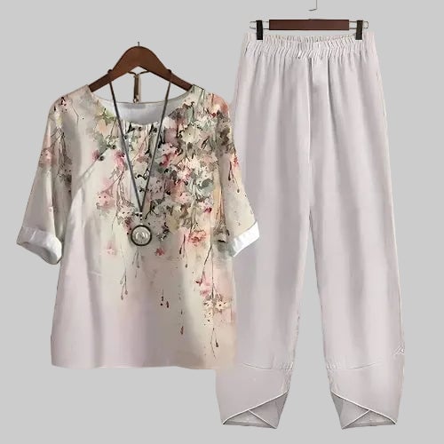Close-up of vibrant butterfly print detail on women's two piece set