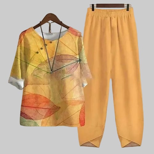 Front view of butterfly print short sleeve top and wide leg pants set in White