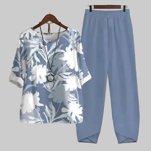Butterfly print two piece set in Orange showcasing relaxed fit and flowy wide leg pants