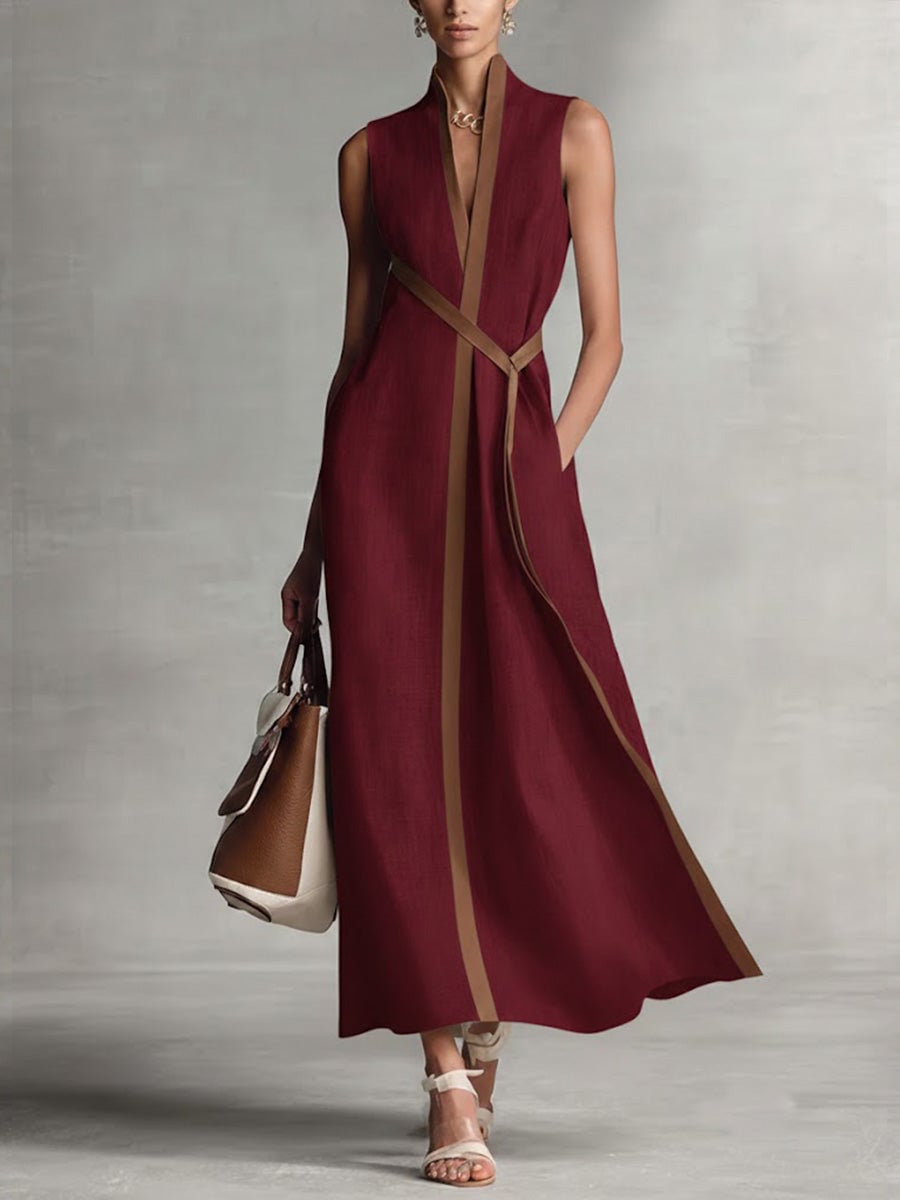 Flat lay of the sleeveless wrap maxi dress in yellow showing the full length and fabric drape