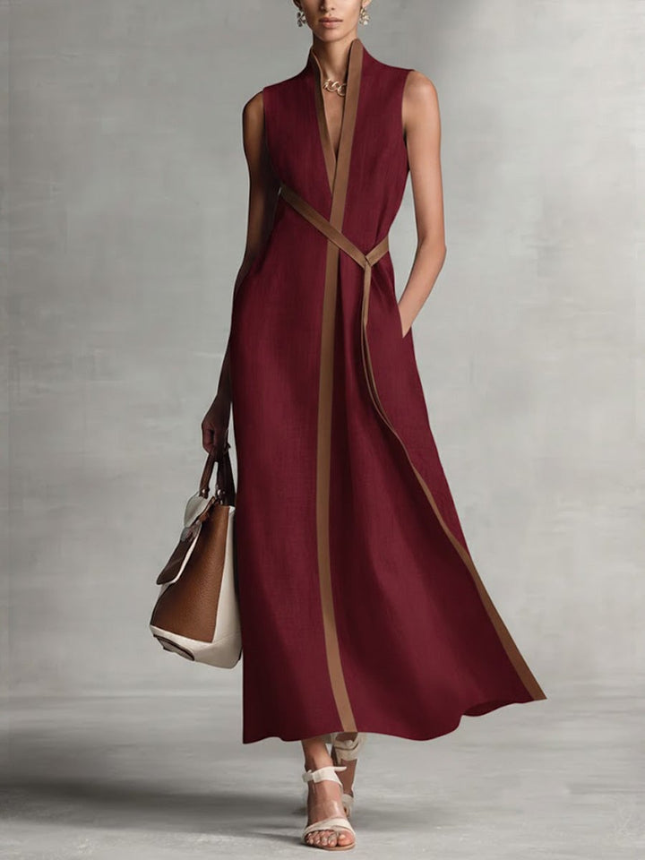 Flat lay of the sleeveless wrap maxi dress in yellow showing the full length and fabric drape