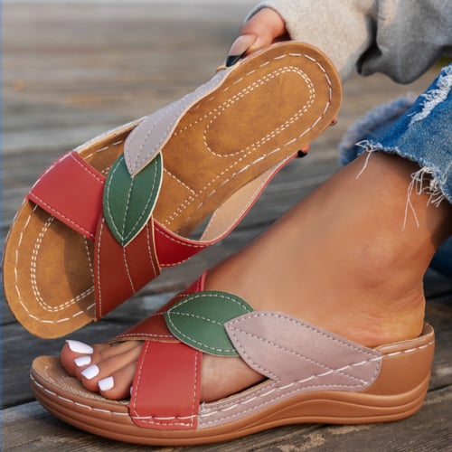 Sole and heel detail of the Petal colorblock wedge sandal showing platform construction