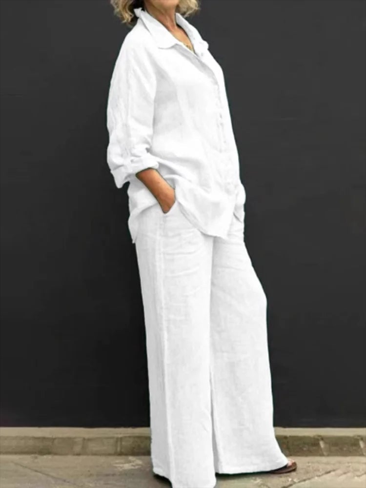 Full-length back view of the Petra linen two-piece set in white, highlighting the relaxed wide-leg pant fit