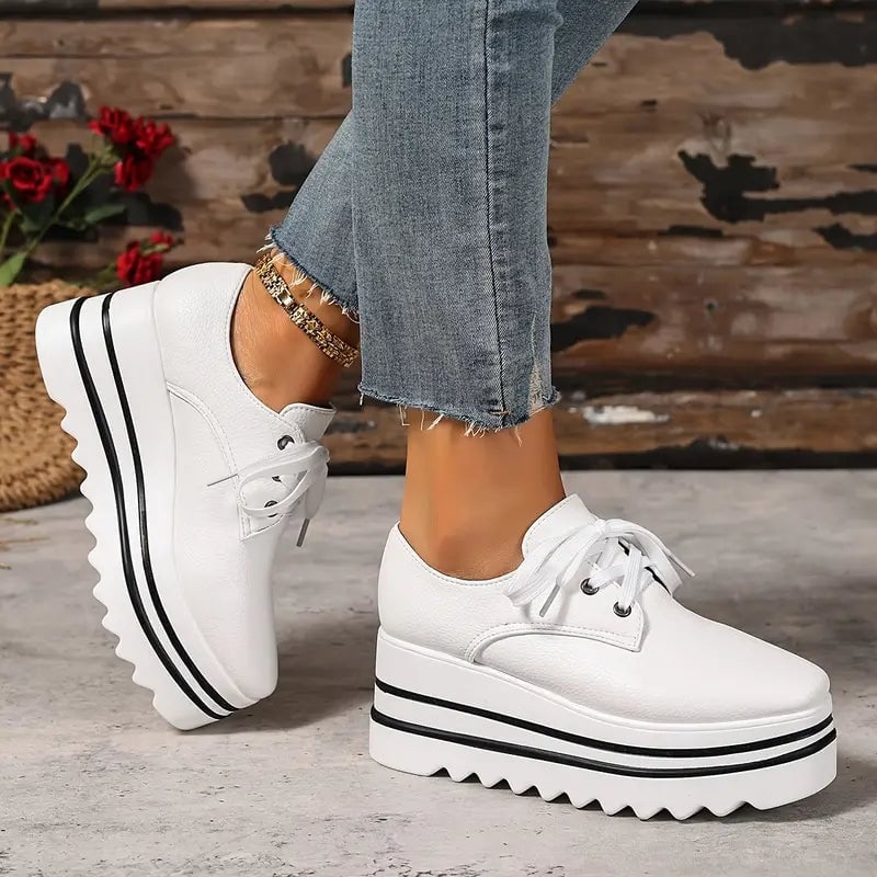 Petra platform Oxford sneaker in white colorway, front three-quarter view