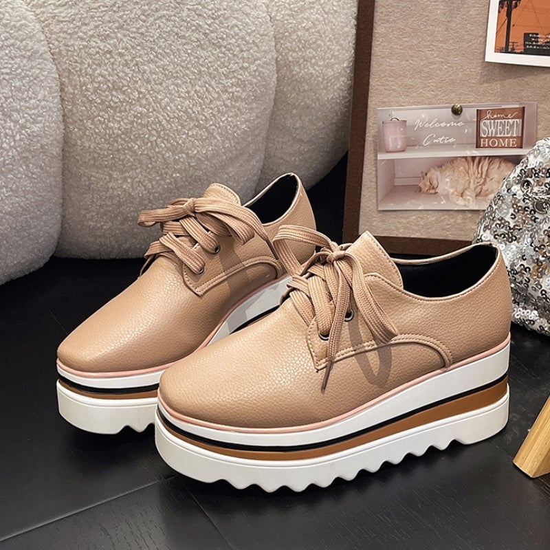 Petra platform Oxford wedge sneaker in black, side profile view