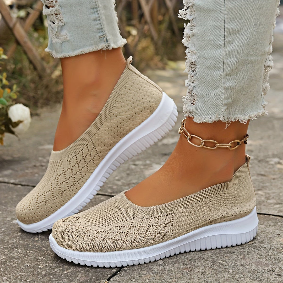 Close-up of the stretchy soft upper on women's slip-on shoes, highlighting the flexible fit