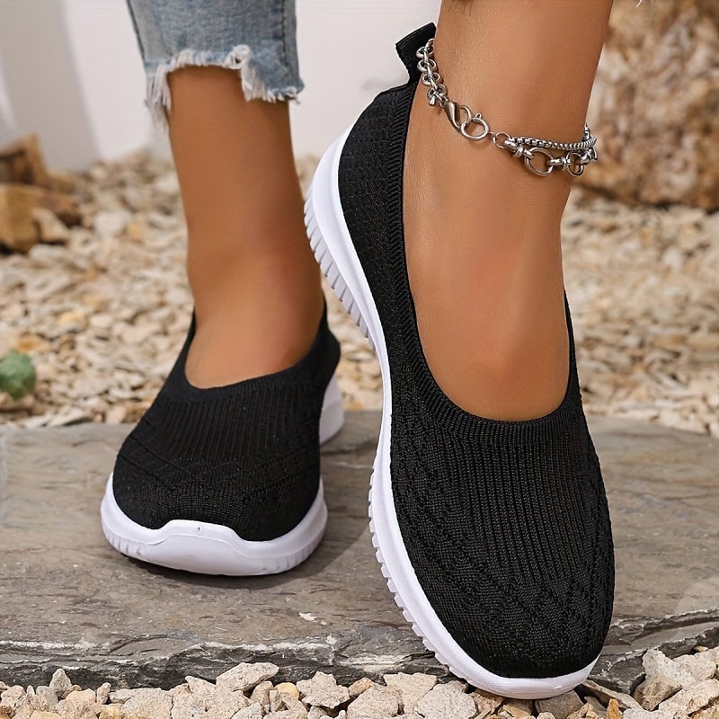 Women's slip-on shoes displayed in multiple colors including apricot, pink, black, purple, and red