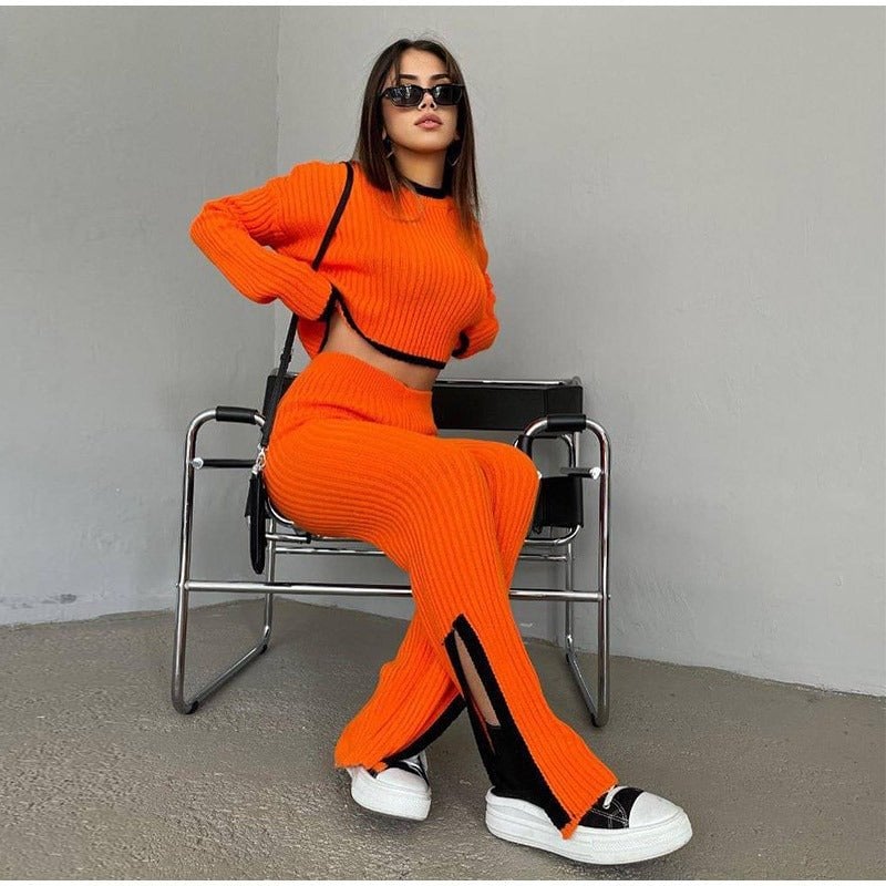 Model wearing white and black contrast knitted two-piece set