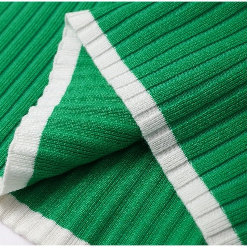 Overhead flat lay of all seven color options of the Piper knitted two-piece set