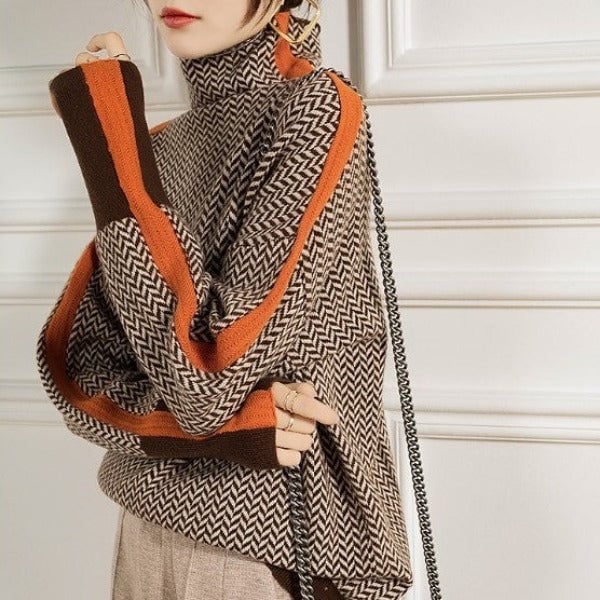 Detail shot of the turtleneck neckline on the Florimay herringbone luxe sweater