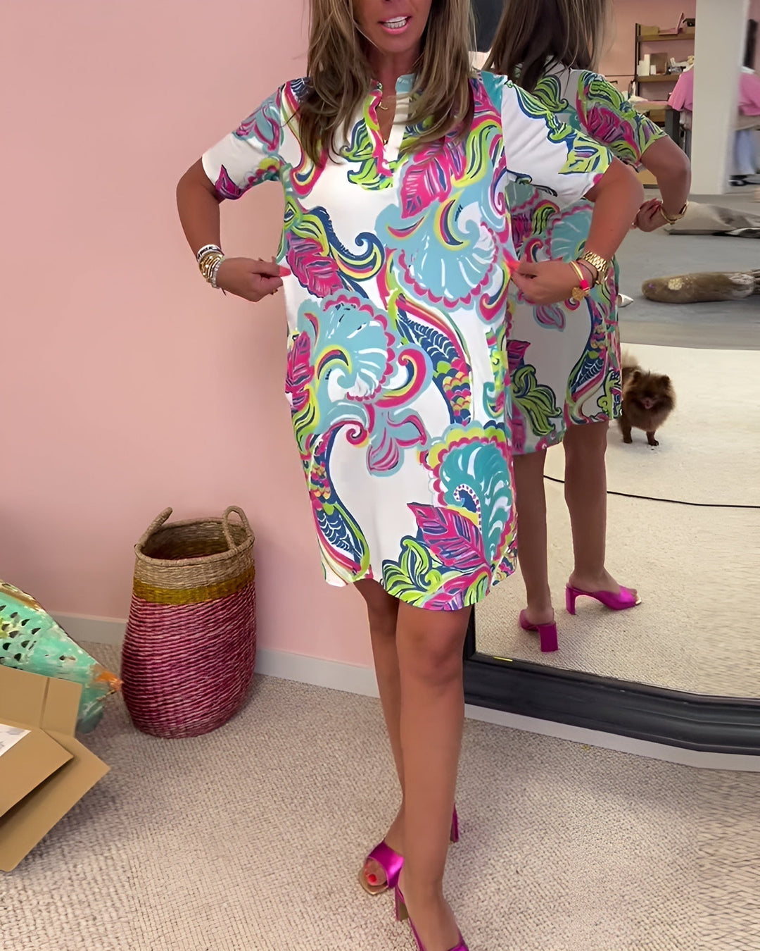 Full-length view of the Piper printed V-neck dress styled with sandals for a summer day look