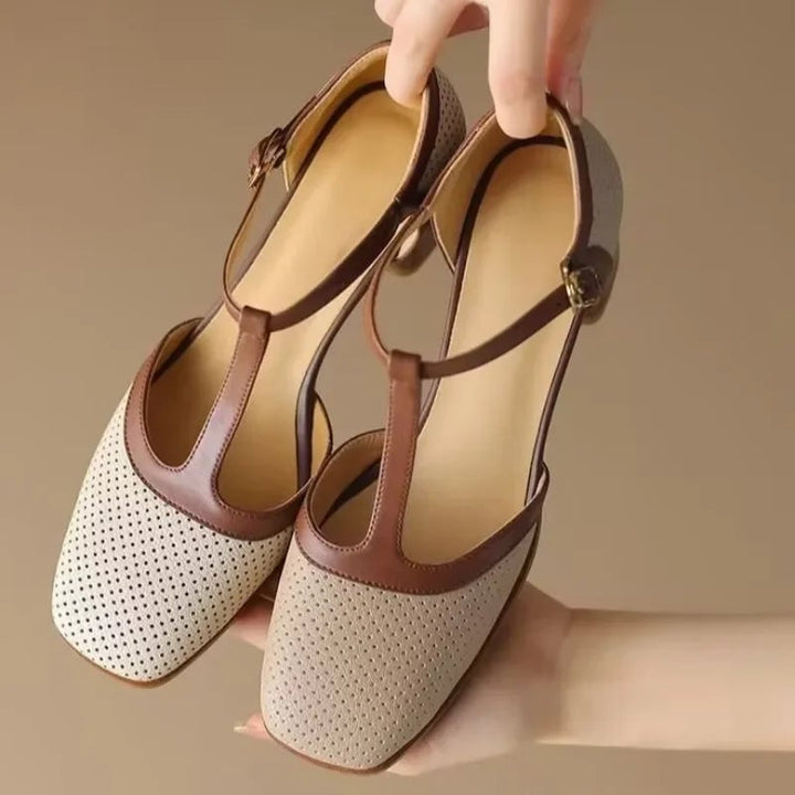 Piper beige T-strap block heel pump showing contrast tan strap buckle detail, front view