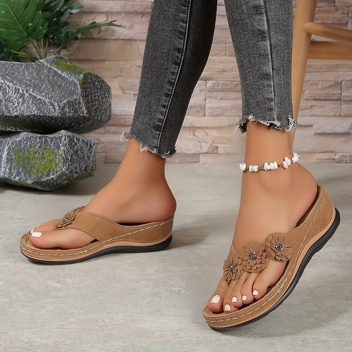 Pippa orthopedic slip-on sandal in navy blue, front three-quarter view on white background