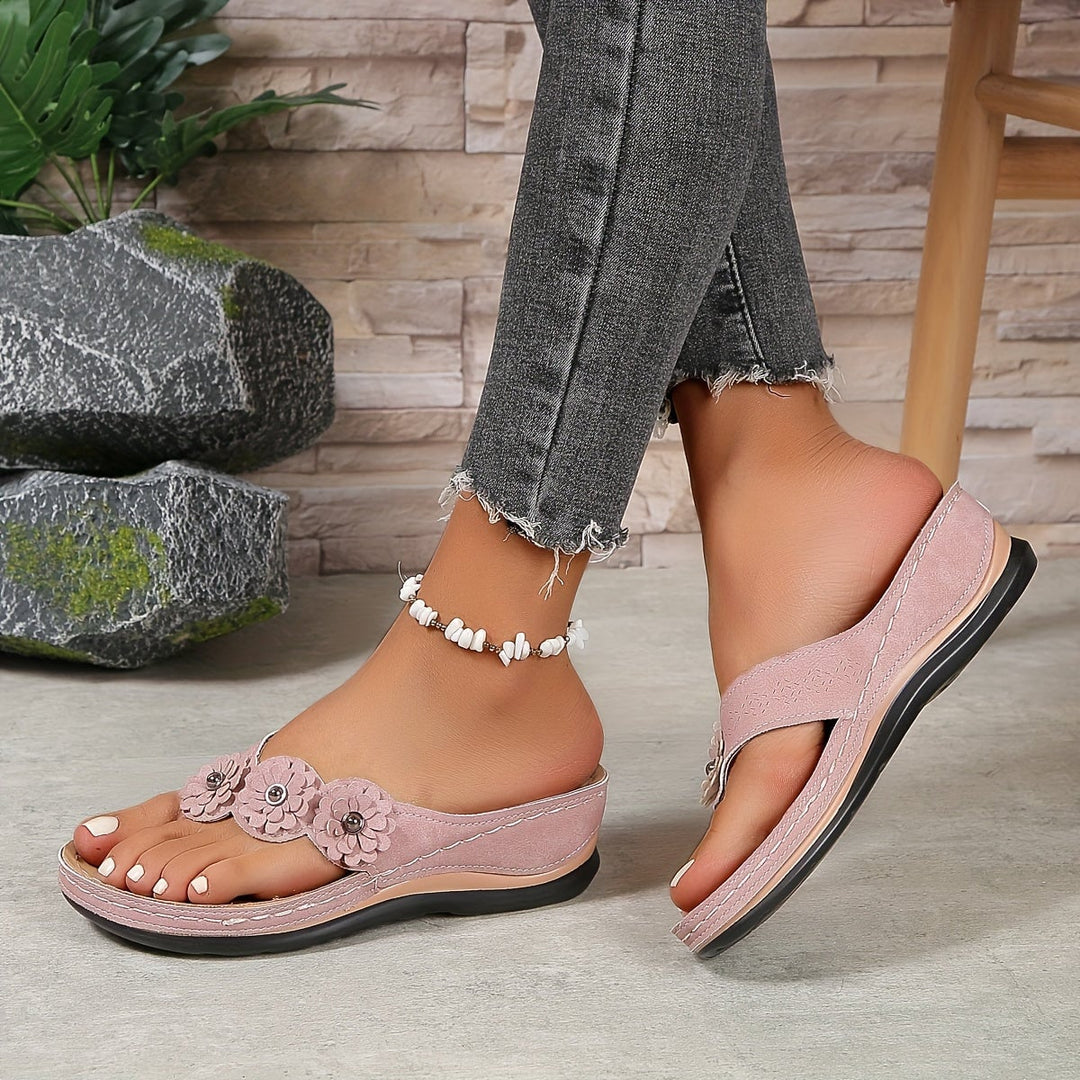 Pippa orthopedic slip-on sandal in navy blue, close-up of footbed cushioning and secure straps