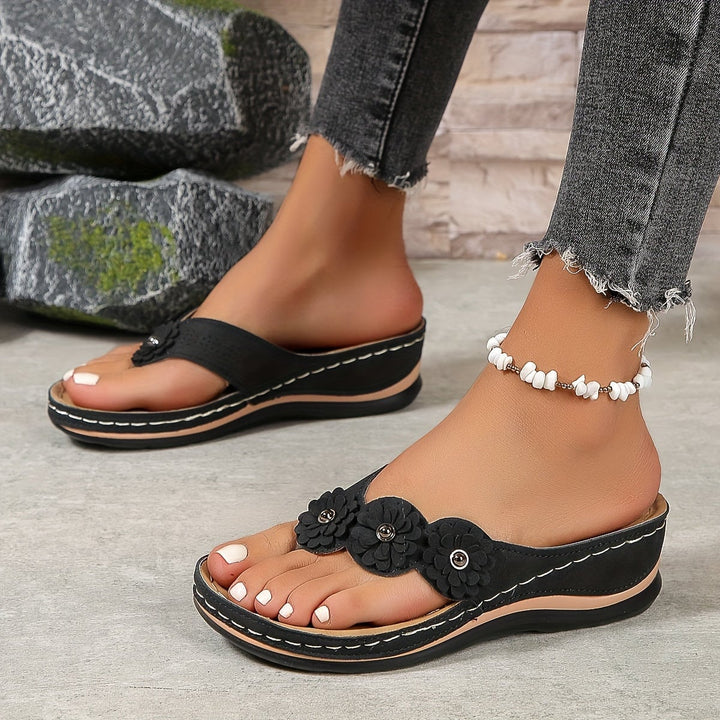 Overhead flat-lay of Pippa orthopedic sandals showing strap layout and plush insole detail
