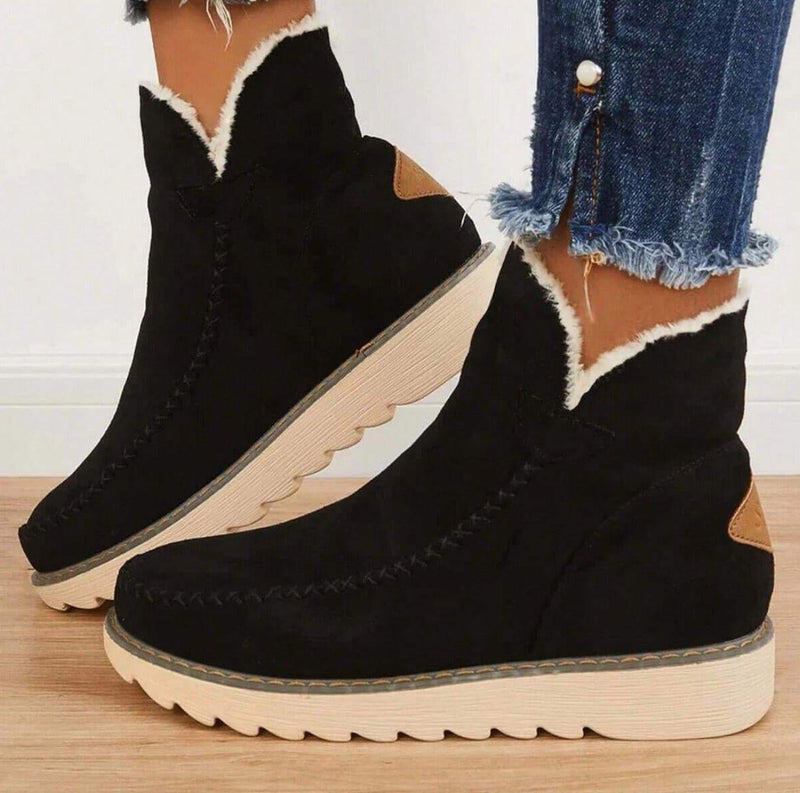 Front view of PolarBelle premium winter boots in black with plush faux-fur lining and ankle-height silhouette