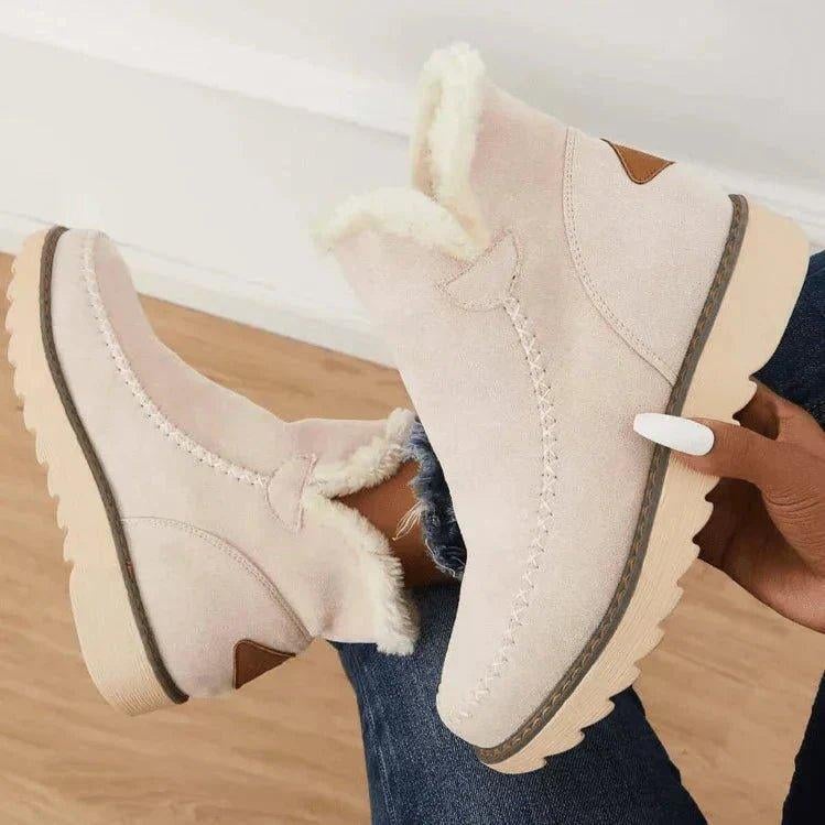PolarBelle winter boots sole close-up highlighting wear-resistant non-slip grip