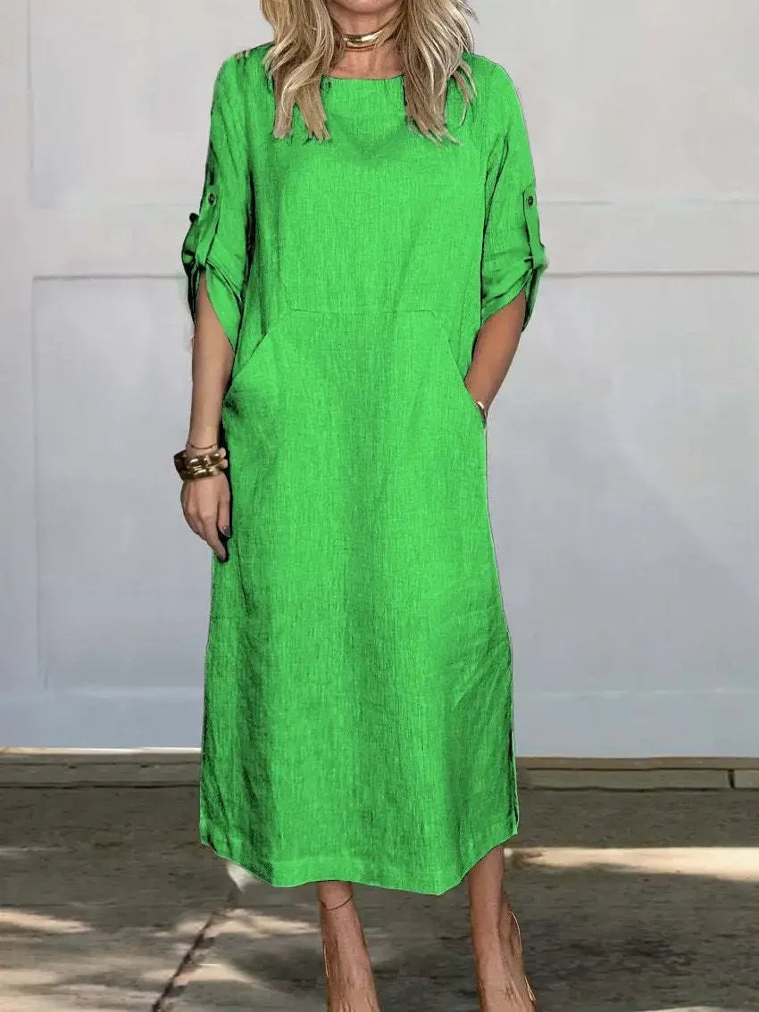 Color options of the Poppy dress displayed side by side including white, black, and blue