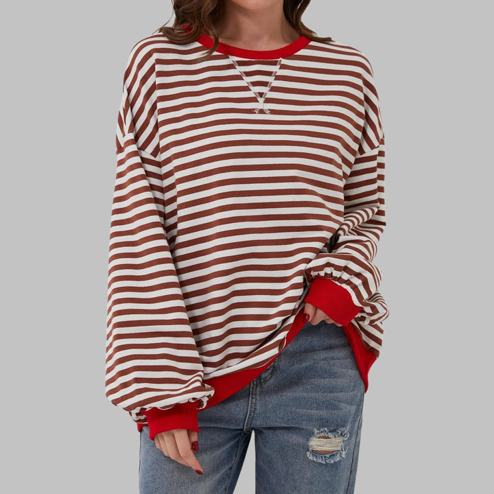 Side profile of the Poppy oversized crewneck sweatshirt showing relaxed silhouette