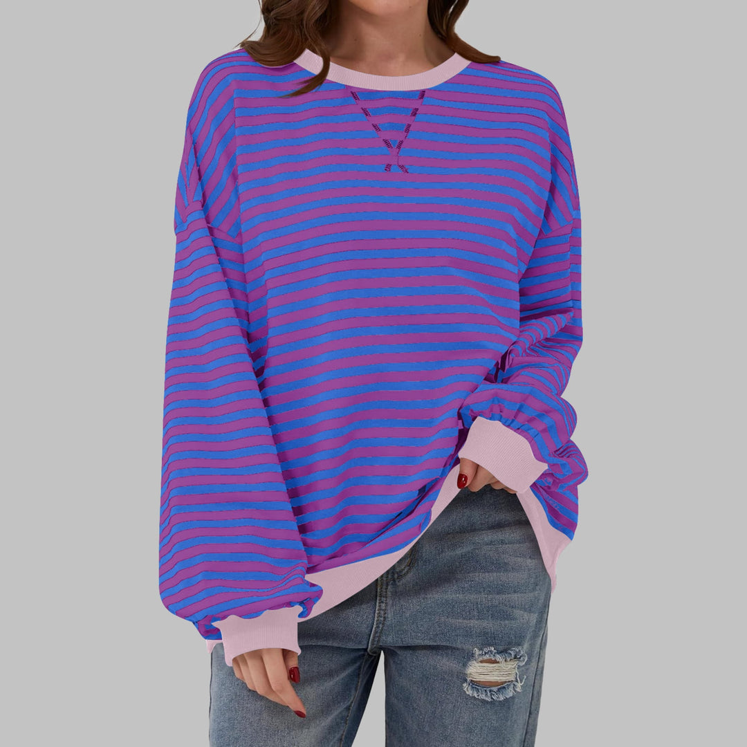 Poppy striped sweatshirt in Sky Blue colorway styled with casual bottoms
