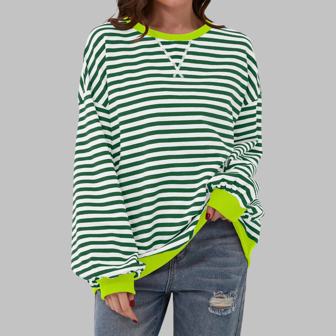 Flat lay of the Poppy striped oversized sweatshirt showing full length and sleeve detail